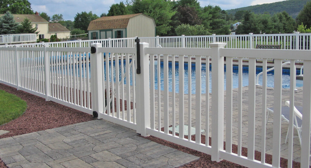 Exterior fence Builders,Inc. vinyl fencing for a pool fence